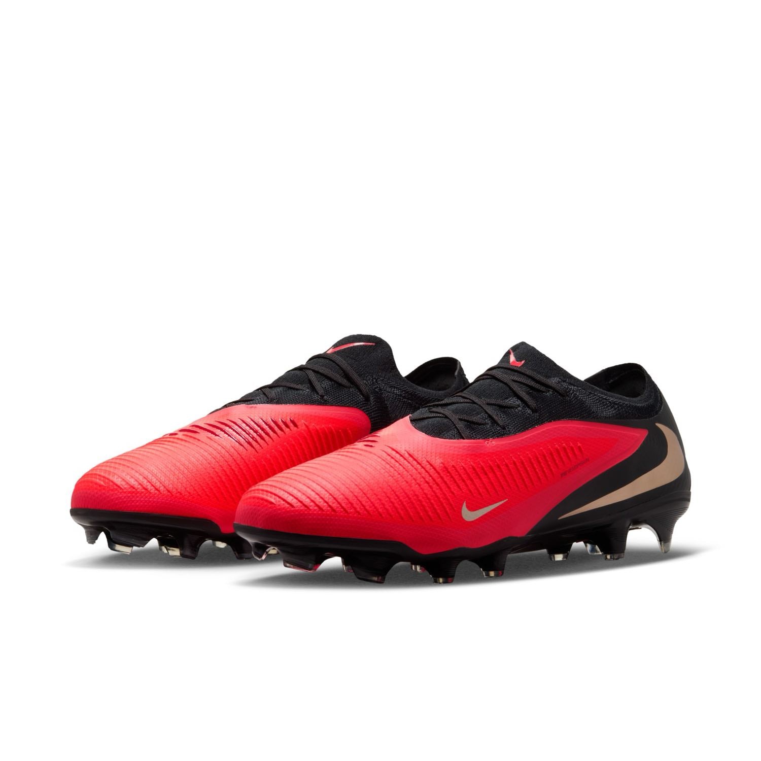 Nike Phantom 6 Low Pro FG red and black firm-ground soccer cleats with VNMSkin upper and Cyclone 360 traction plate.