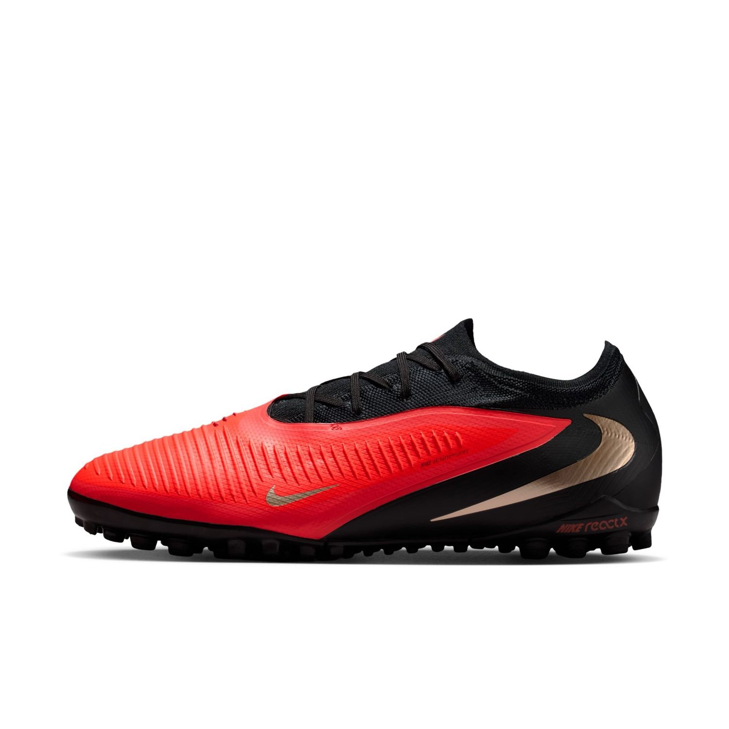 Nike Phantom 6 Low Pro TF red and black turf soccer shoes with VNMSkin upper and rubber outsole.