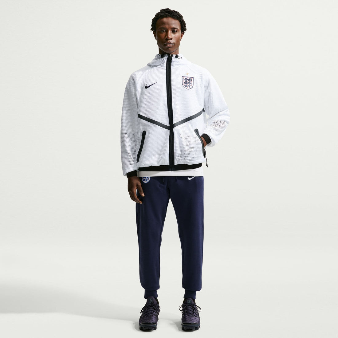 England Anthem Jacket full-body view with black pants