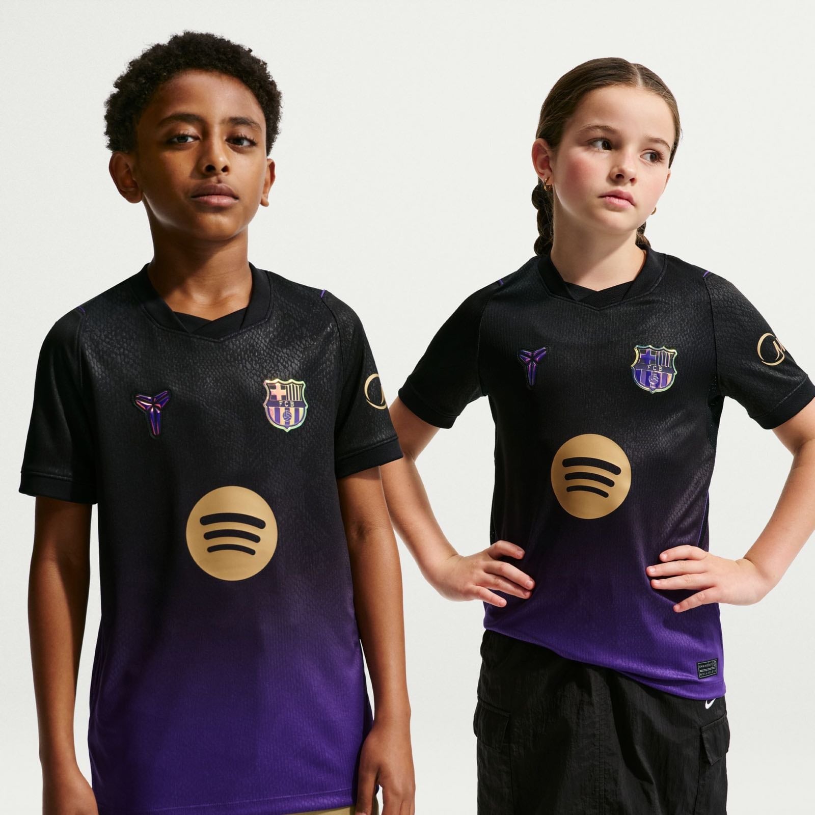 FC Barcelona 2026/27 Stadium Away Jersey Youth in black and purple.
