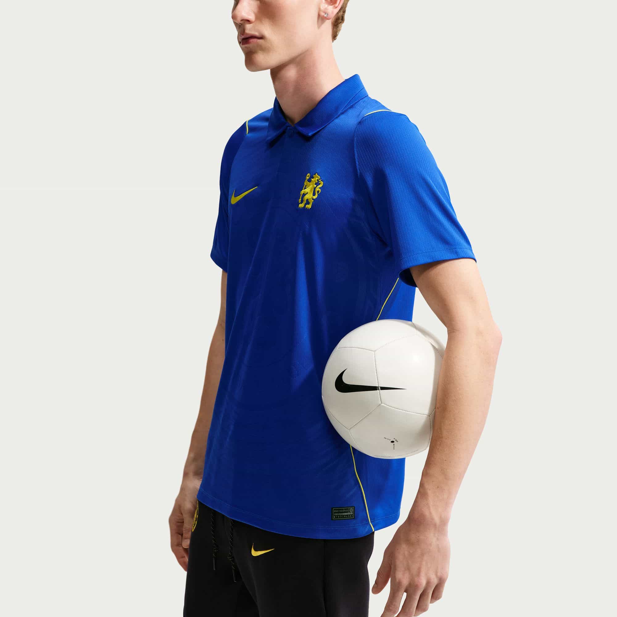 Chelsea FC 2026/27 Stadium Home Jersey side view with soccer ball