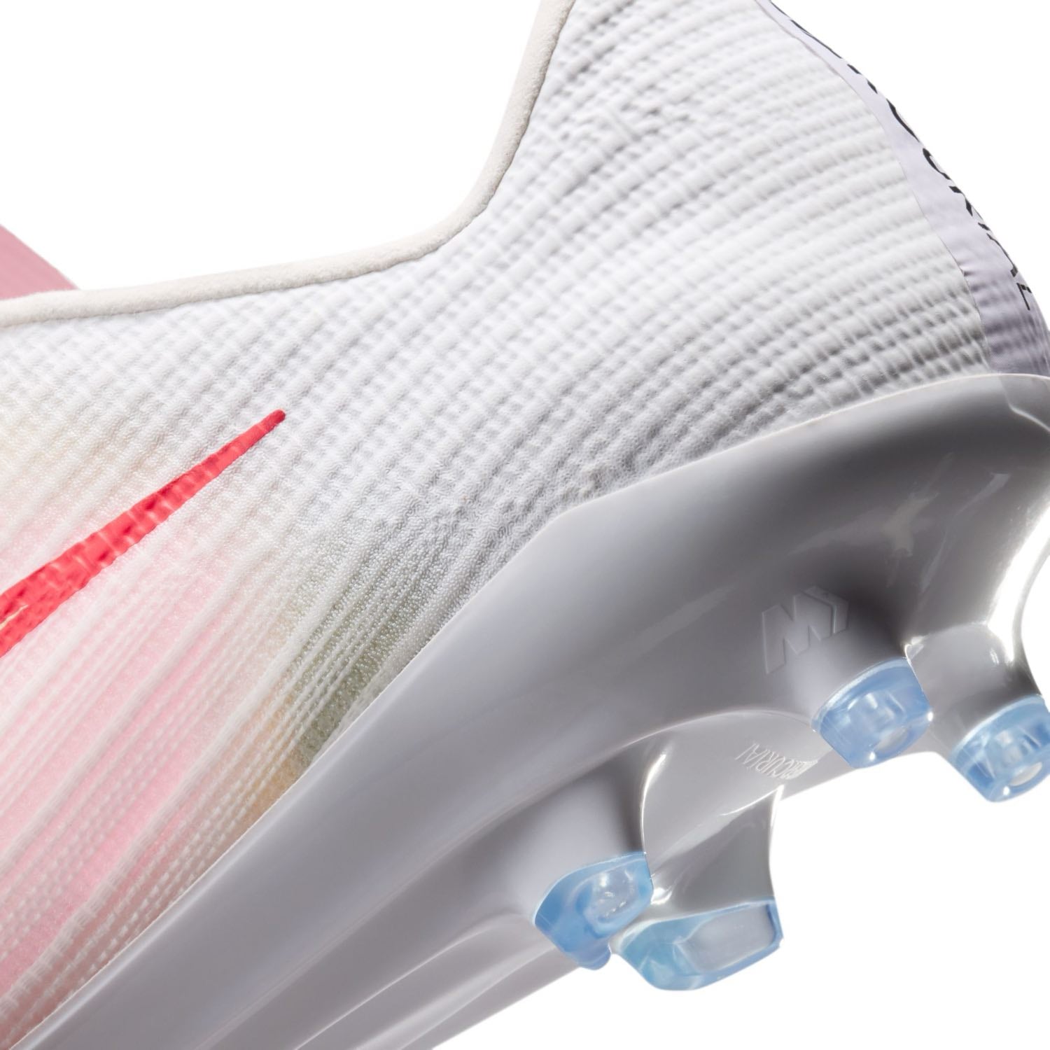 Nike Mercurial Superfly 11 Pro AG low-top artificial-grass soccer cleats in white with orange details and Air Zoom cushioning.