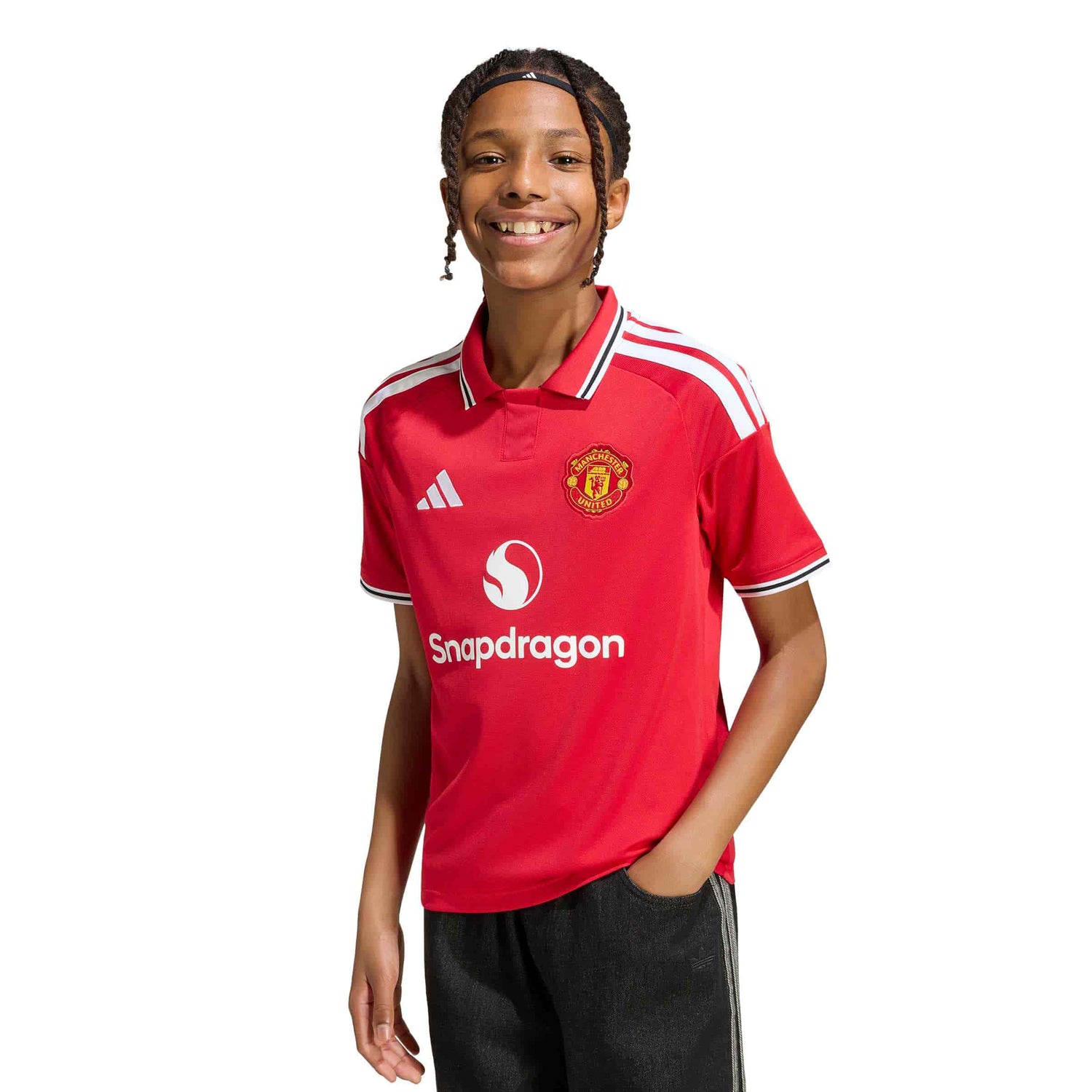 Kid wearing Manchester United 26/27 Home Jersey Youth front view