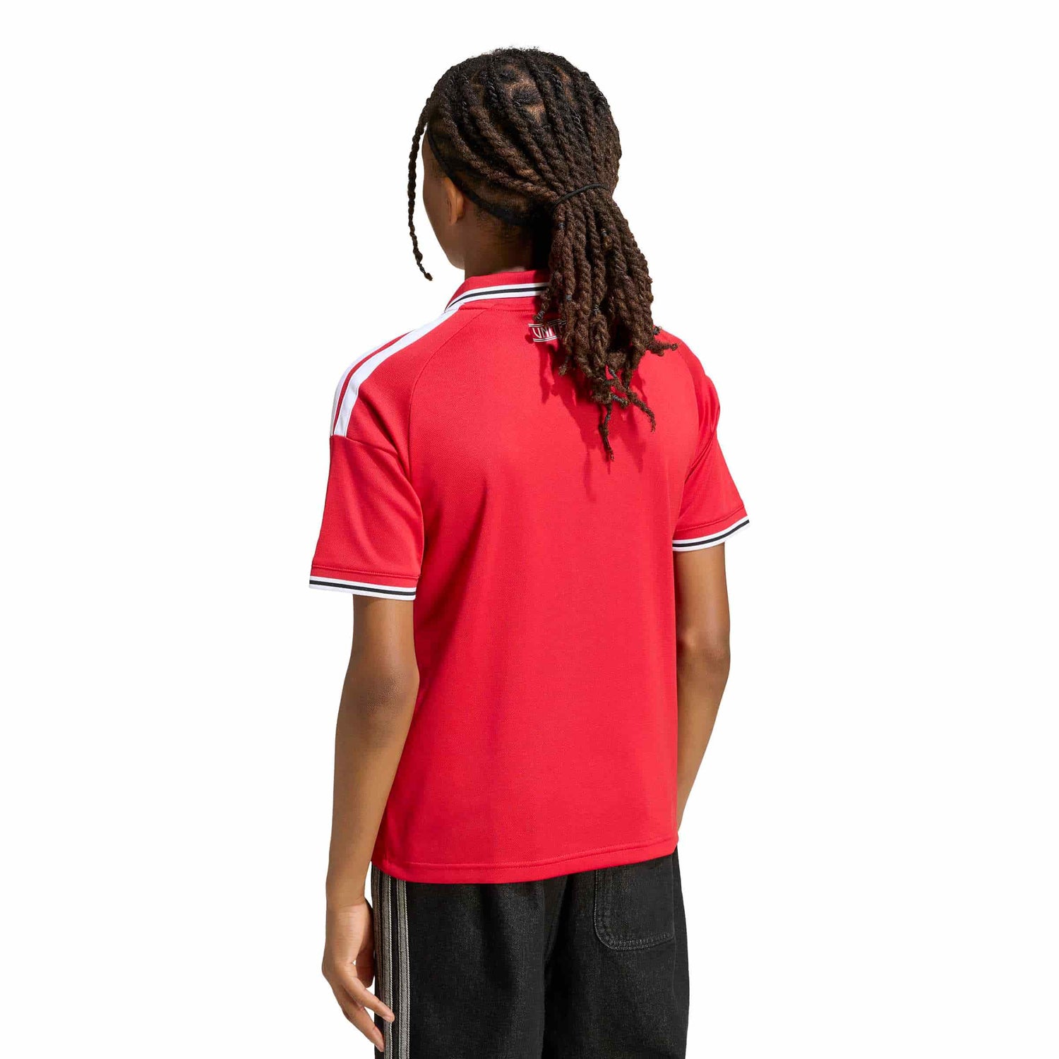 Kid wearing Manchester United 26/27 Home Jersey Youth back view