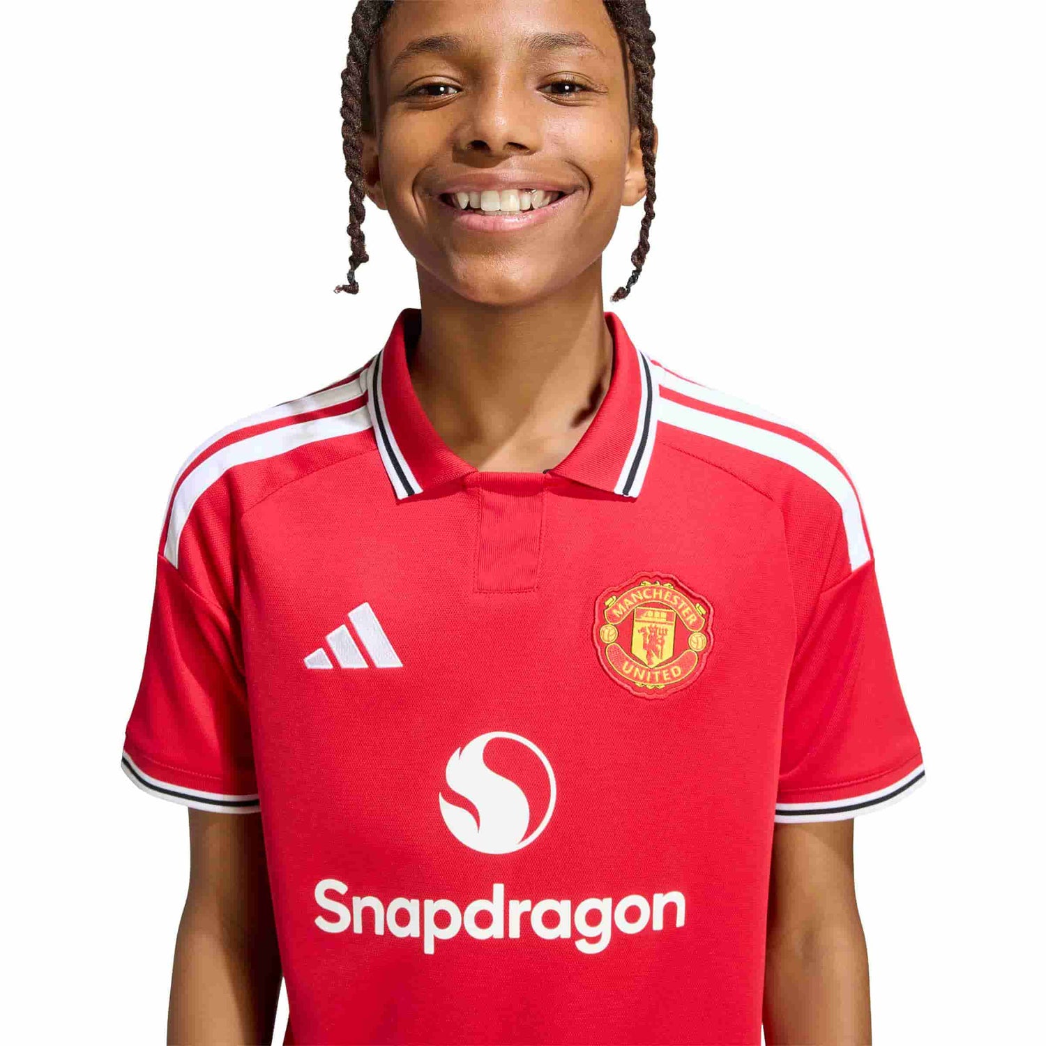 Kid wearing Manchester United 26/27 Home Jersey Youth front view
