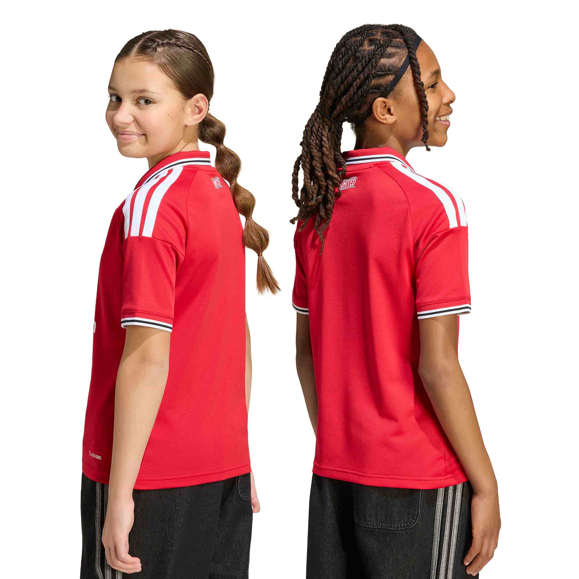 Kid wearing Manchester United 26/27 Home Jersey Youth back view