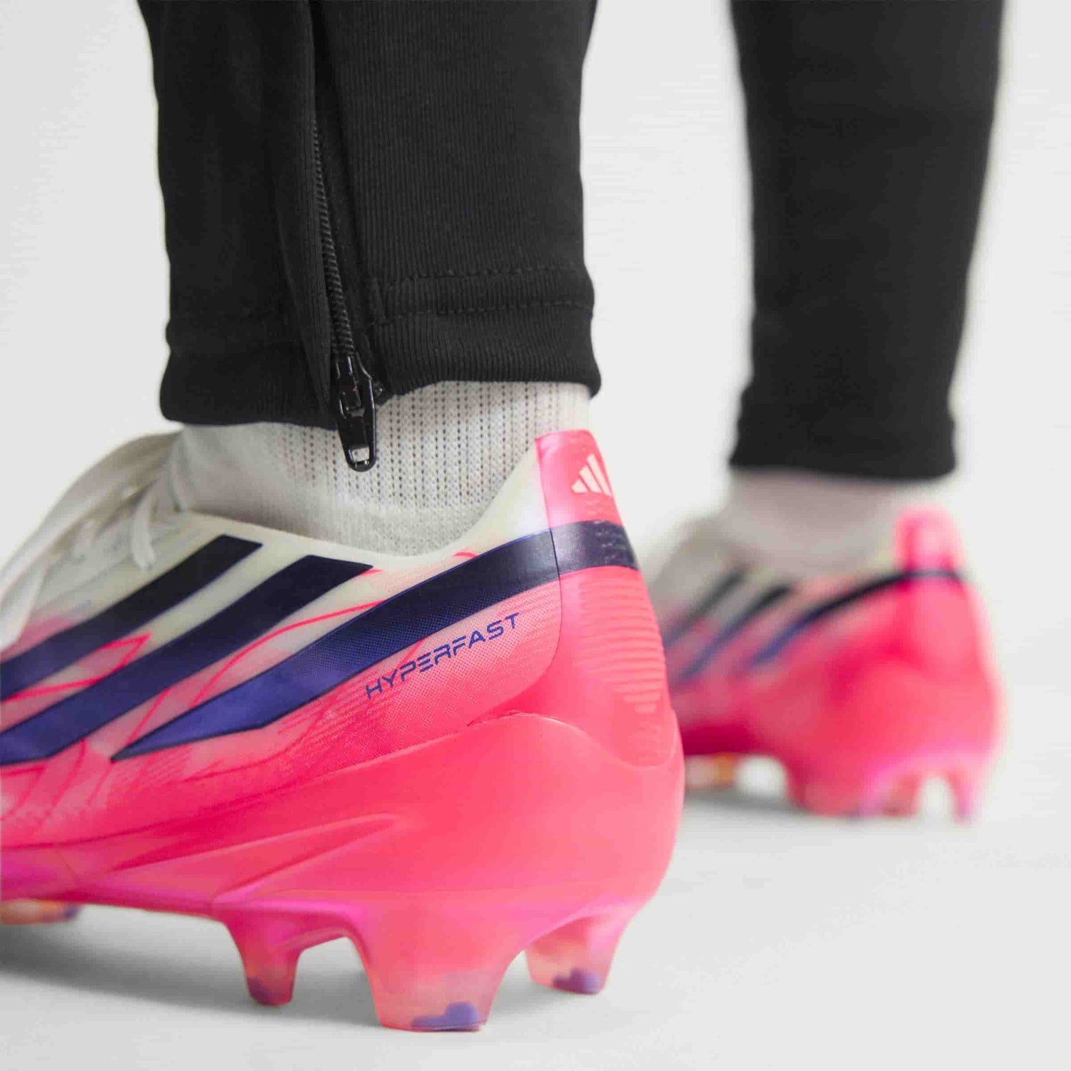 adidas F50 Hyperfast Elite FG soccer cleat in silver, navy and pink with firm-ground outsole