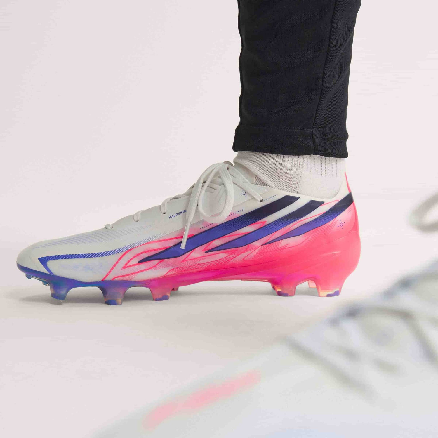 adidas F50 Hyperfast Elite FG soccer cleat in silver, navy and pink with firm-ground outsole