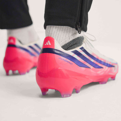 adidas F50 Hyperfast Pro FG soccer cleats in white, pink and navy with firm-ground outsole