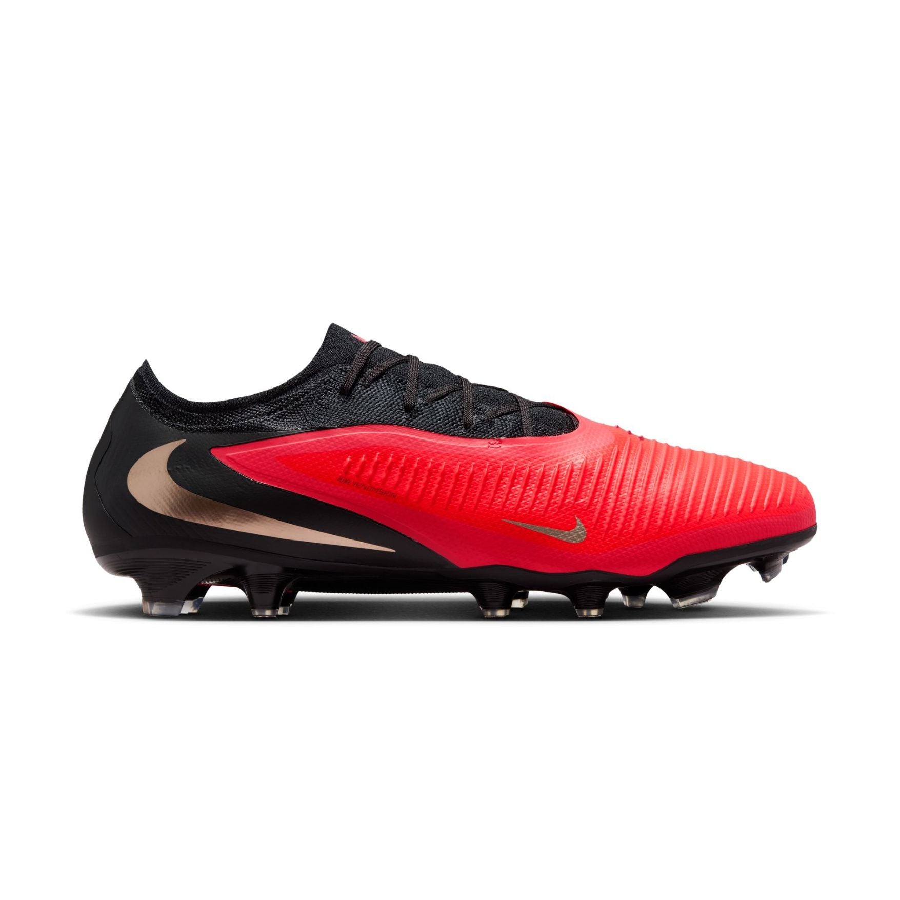 Nike Phantom 6 Low Pro FG red and black firm-ground soccer cleats with VNMSkin upper and Cyclone 360 traction plate.